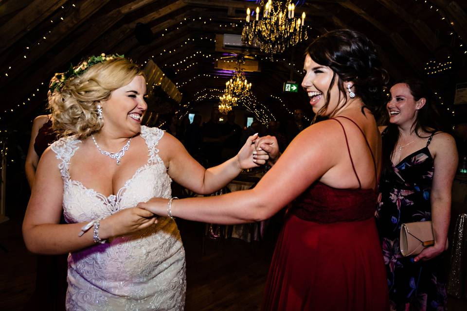 Nicole & Bridesmaid dancing