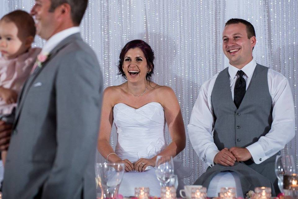 Bride & groom laughing