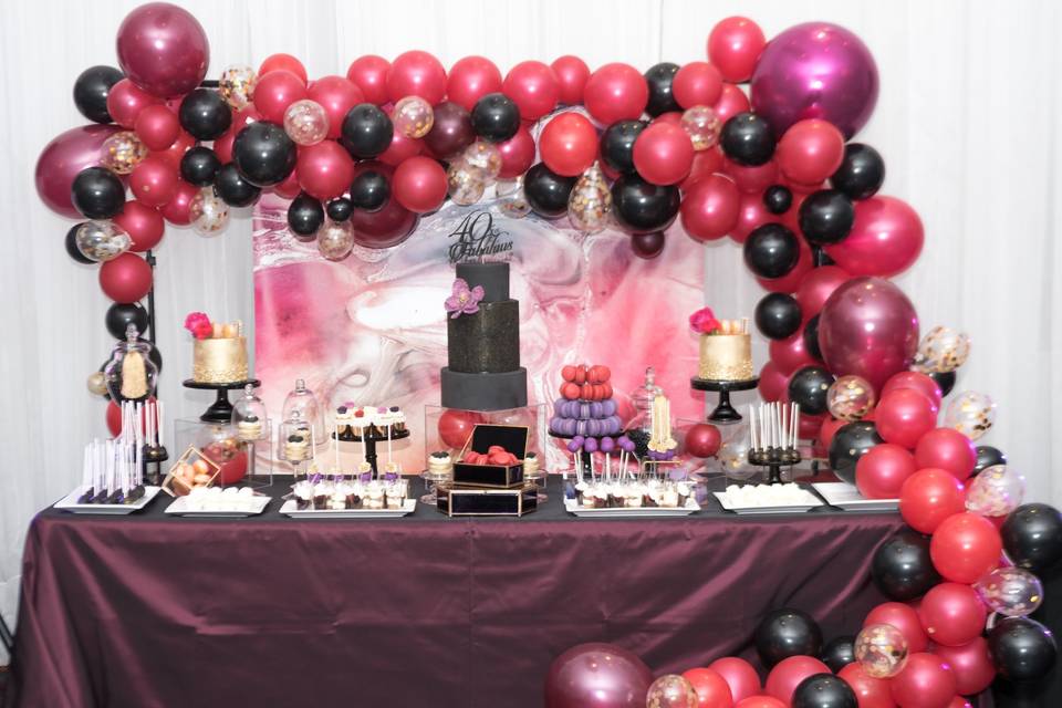 Black and fuchsia sweet table