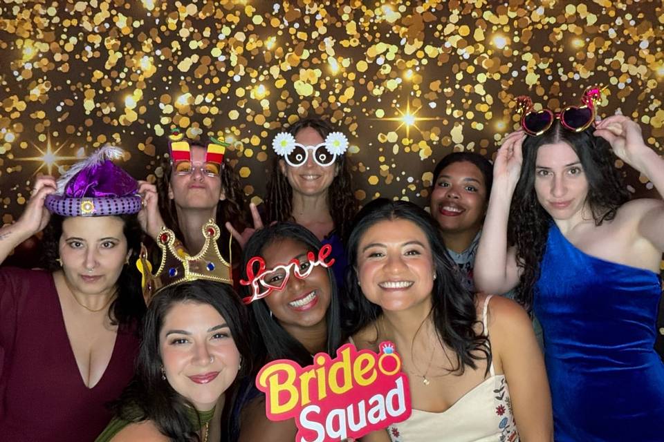 Wedding photo booth fun with the bride and friends