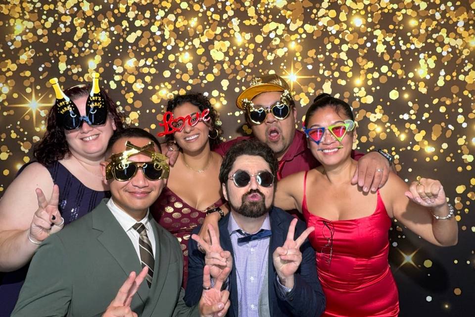 Wedding guests with photo booth props