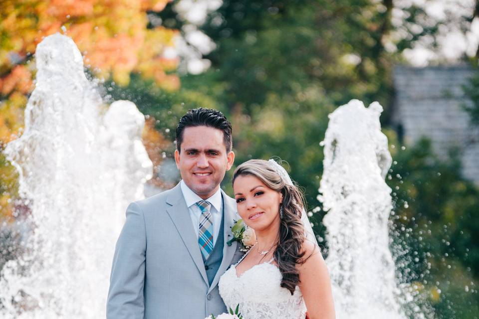 Happy couple with fountain