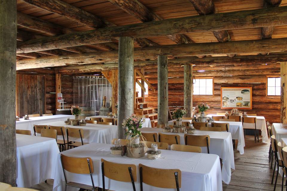 Indoor ceremony in barn.