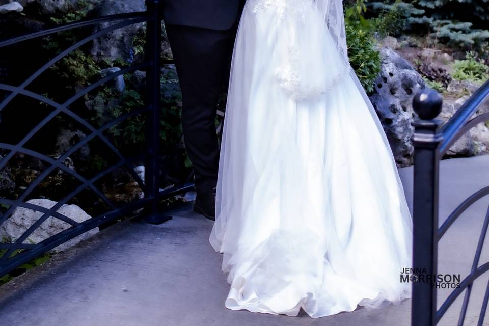 Bride and groom on bridge