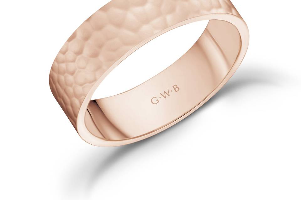 A 6mm rose gold hammered band