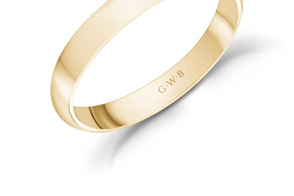 A 3mm low dome yellow gold band