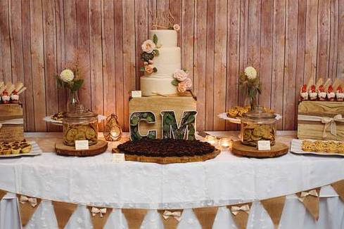 Custom wedding cake and dessert display