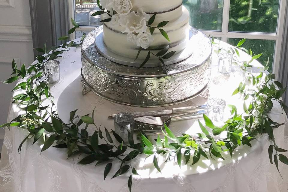 Naked cake with greenery