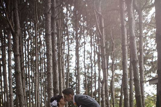 Bride and groom in the woods