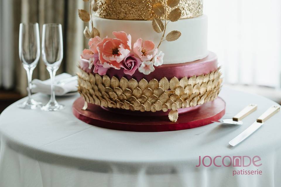 Gold and blush wedding cake