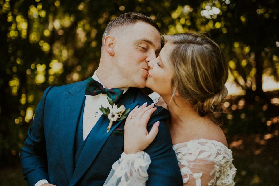 Bride and groom kiss