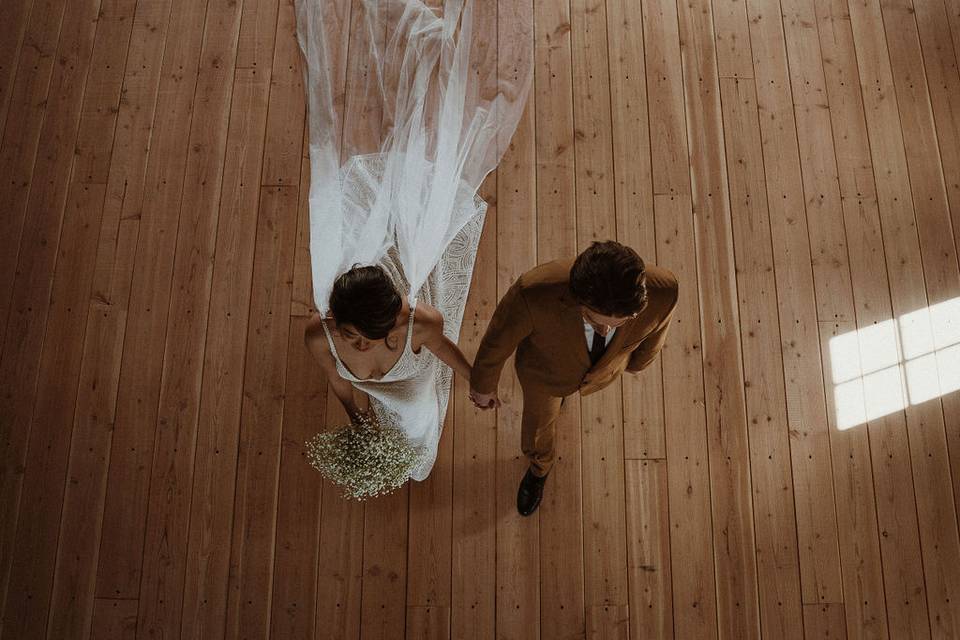 Bride and Groom on wood floor