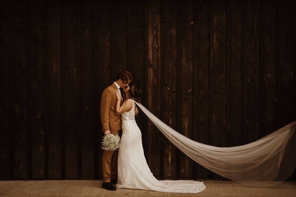 Black Barn wedding couple