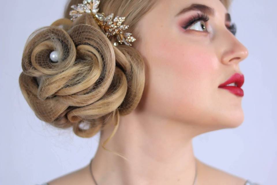 Bridal Updo with a pin and vei