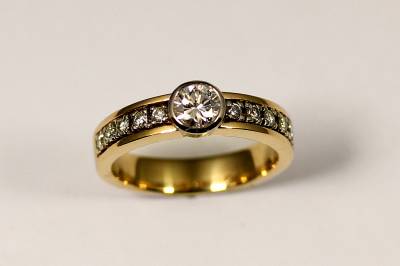 Ring with customer's diamonds