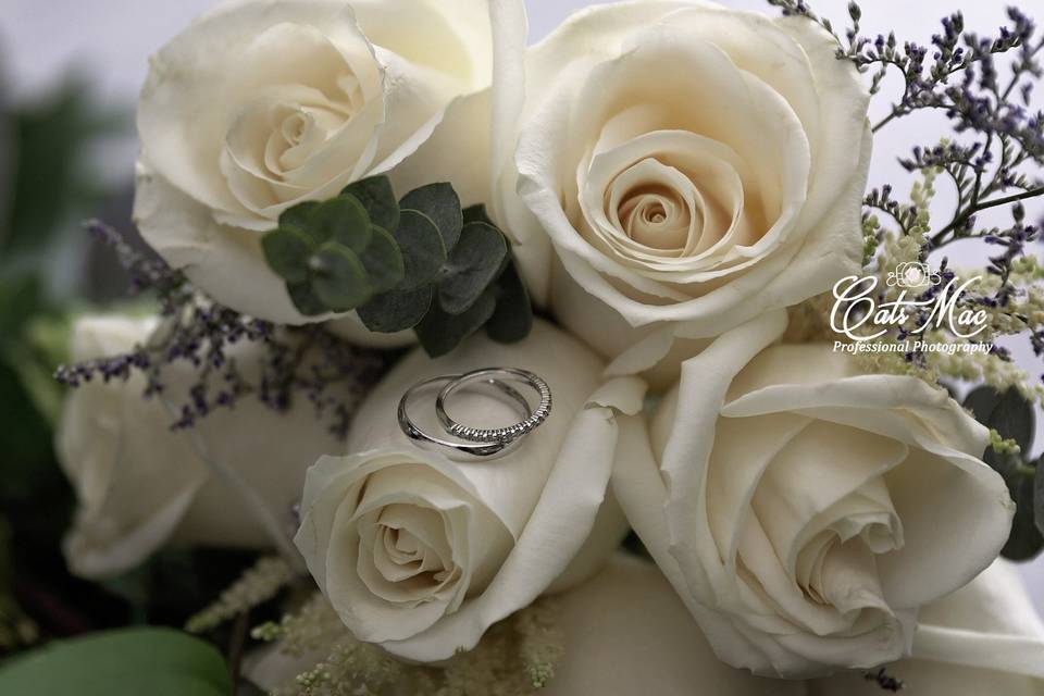 Rose bouquet wedding rings