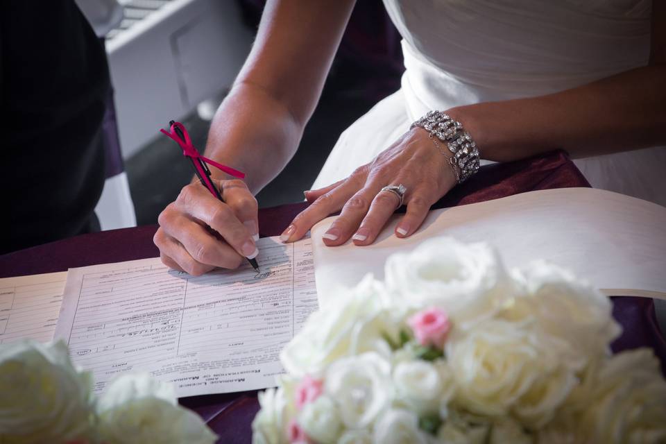 Signing the marriage cert