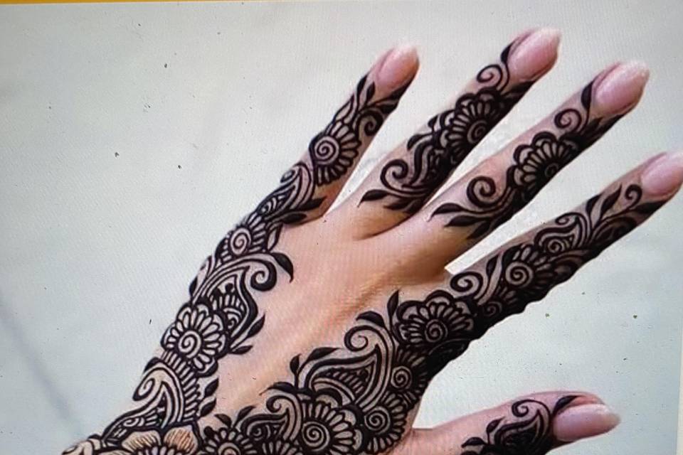 Henna design on the hand