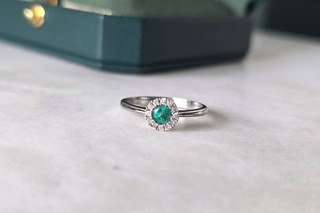 Bezel emerald diamond halo