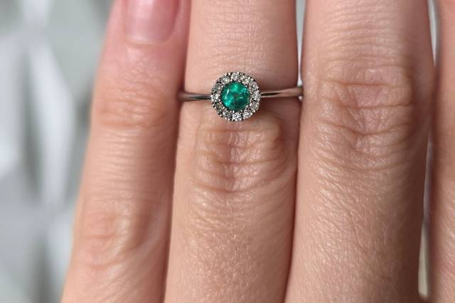 Bezel emerald diamond halo