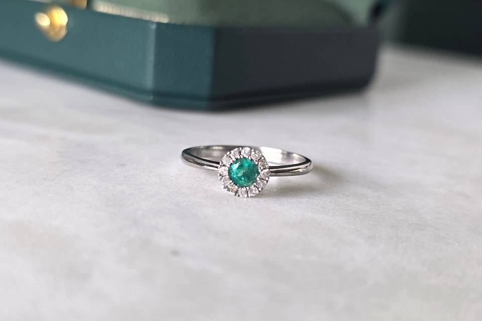 Bezel emerald diamond halo