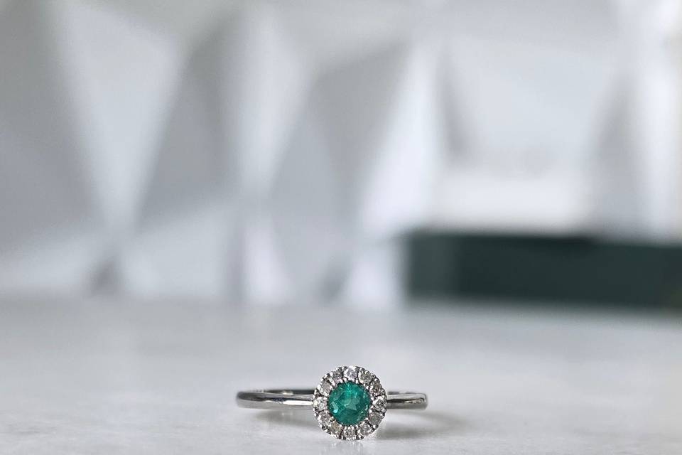 Bezel emerald diamond halo