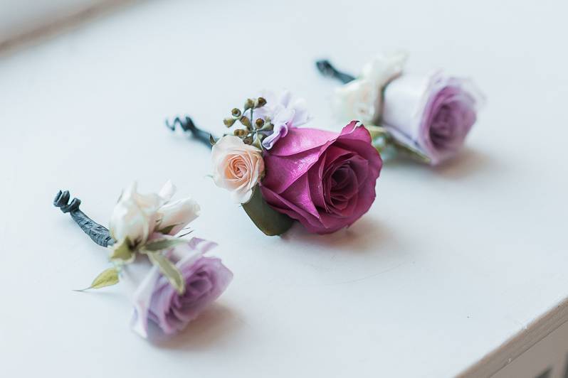 Purple rose boutonnieres