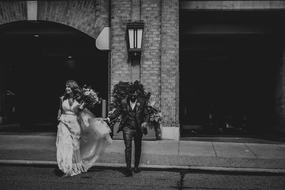 Bride groom crossing street