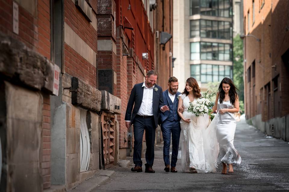 Wedding party in alley