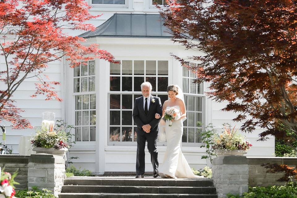 Dad walking bride down aisle