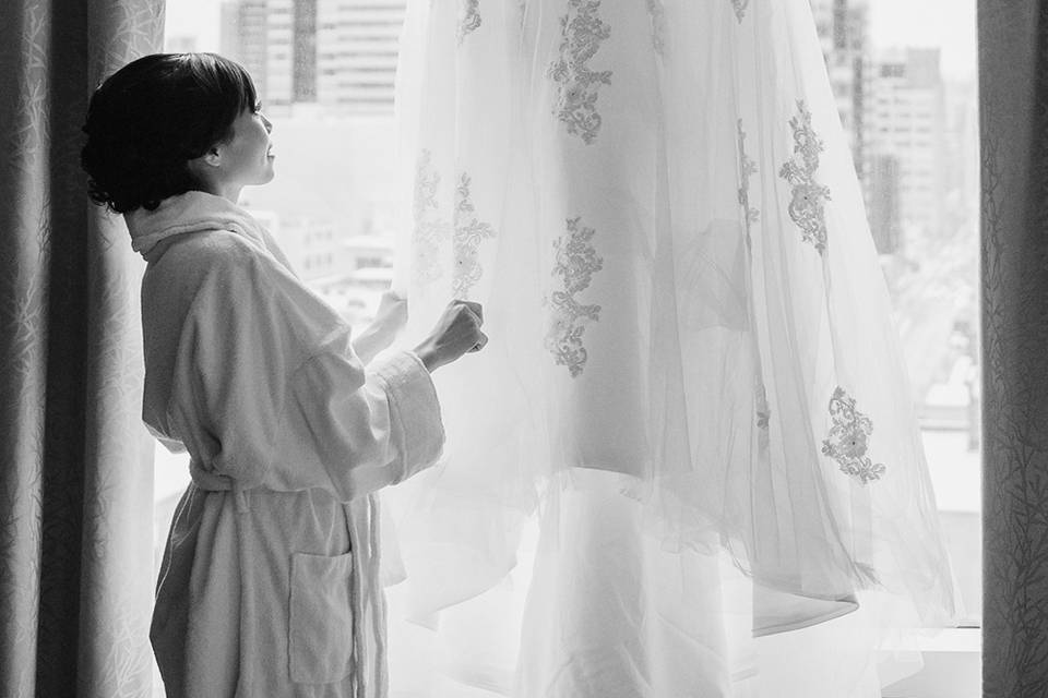 Bride looking at dress