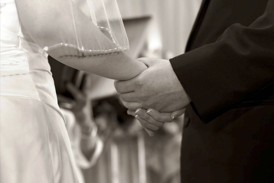 Ceremony close up holding hands.jpg