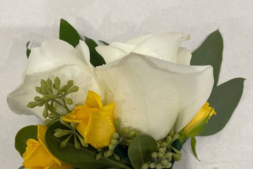 Groom boutonnière in yellow