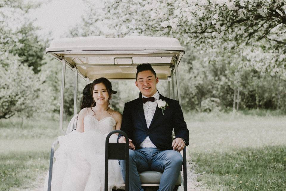 Bride and Groom Golf Carting