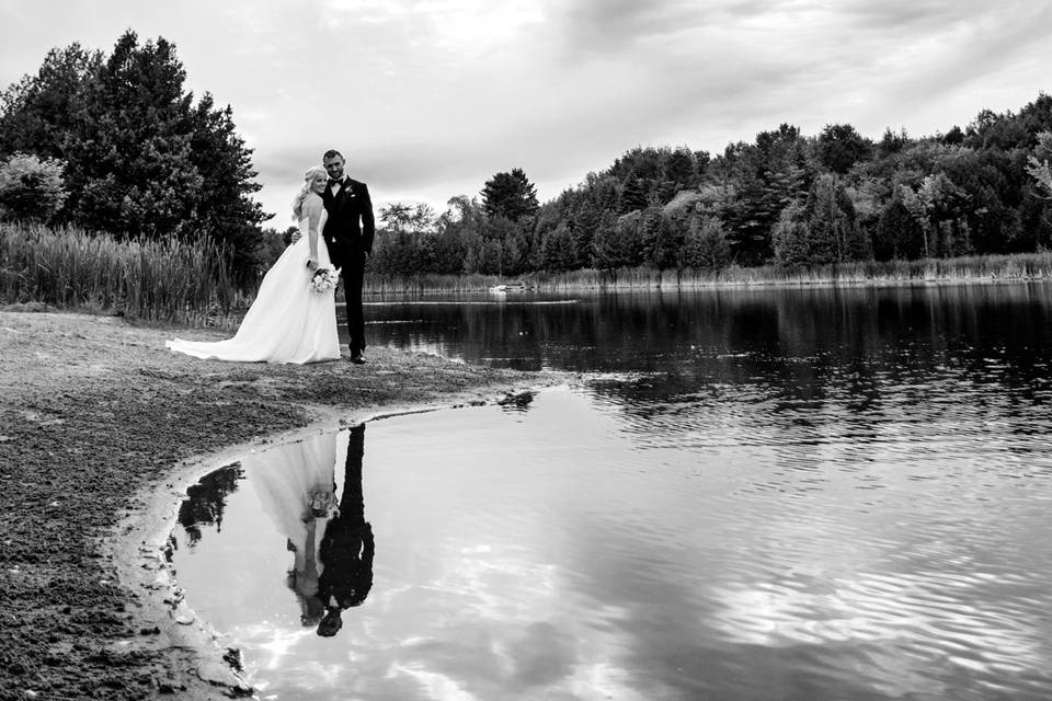 Wedding couple by lake