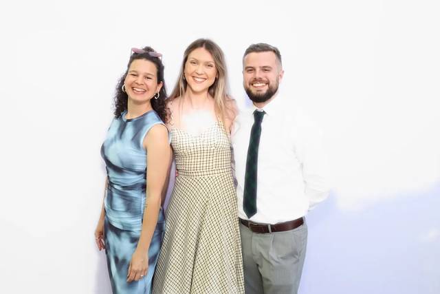 Wedding guests having fun with the props
