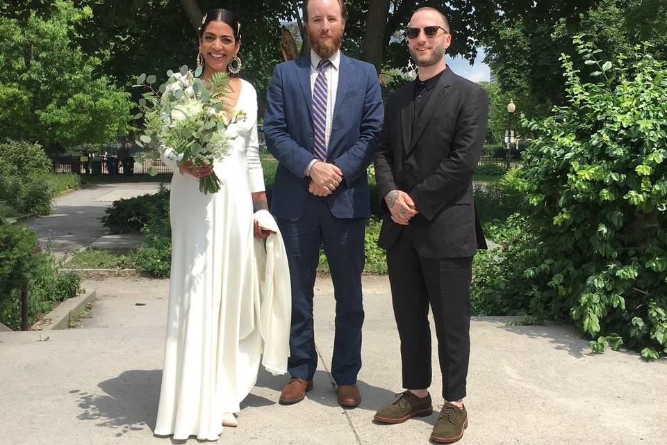 Couple with officiant