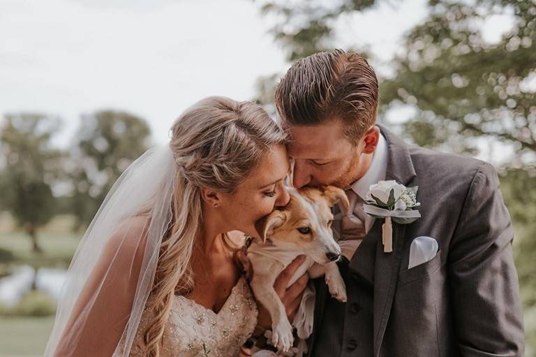 Couple with their fur baby