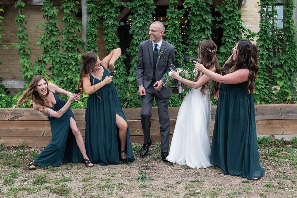 Groom and bridal party play