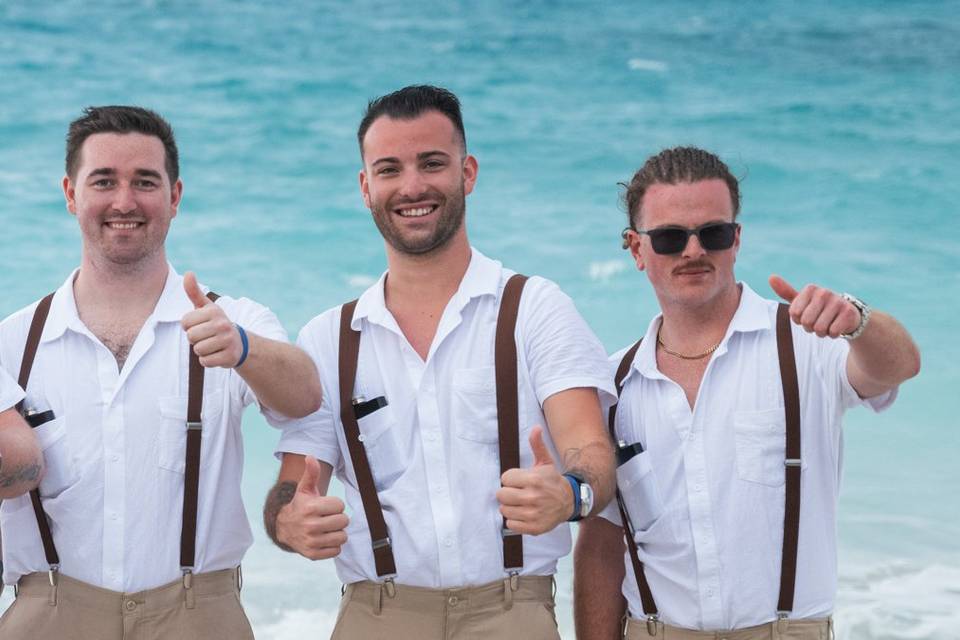 Groom groomsmen on beach