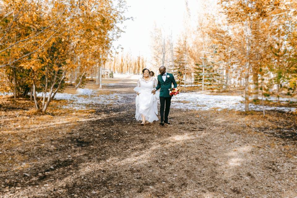 Bride and groom in woods