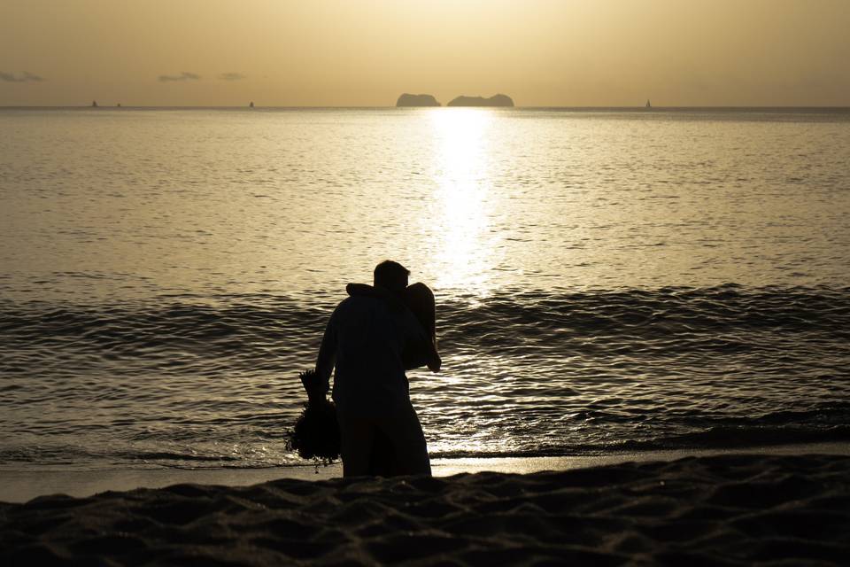 Alex and Abi at the beach at sunset