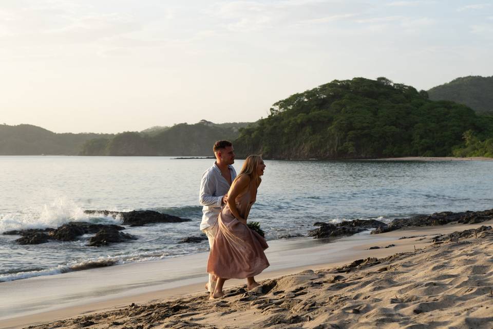 Alex and Abi on the beach - having fun