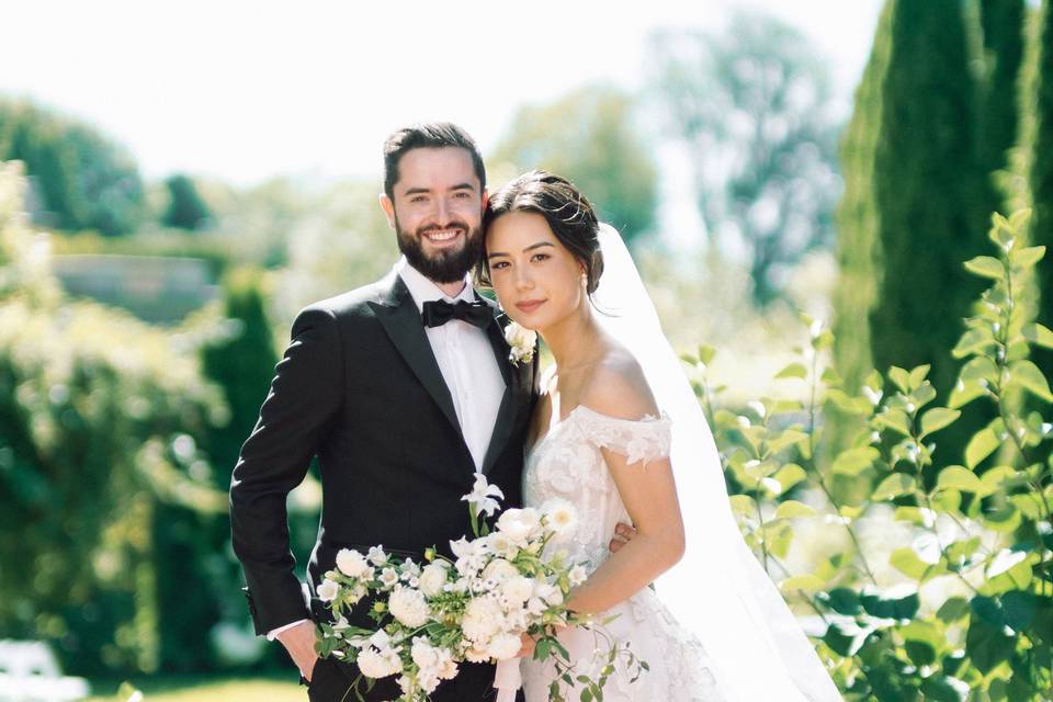 Pair smiling at the camera