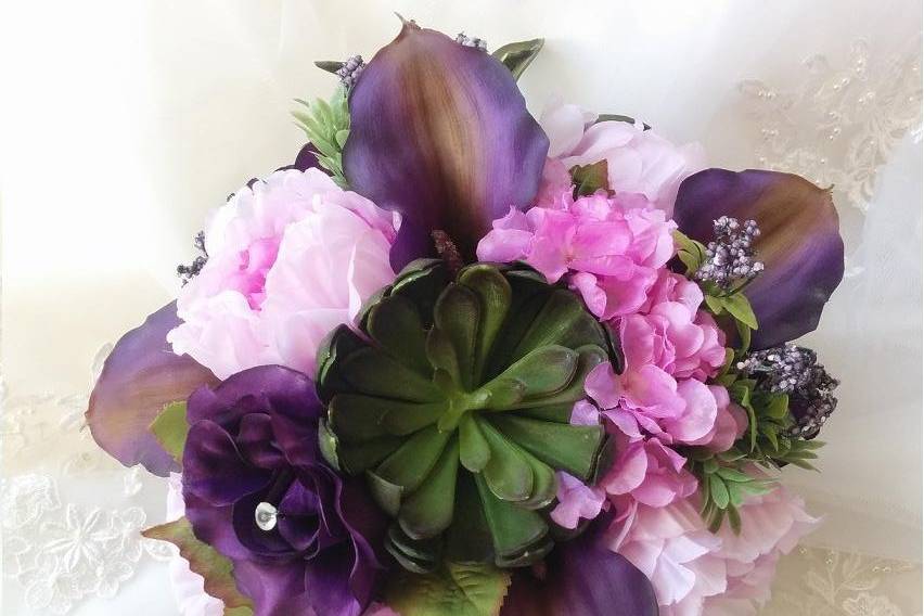 Purple succulent bouquet.JPG