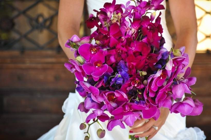 bright-wedding-flowers-bridal-bouquet-orchids-fuschia-purple.original.jpeg