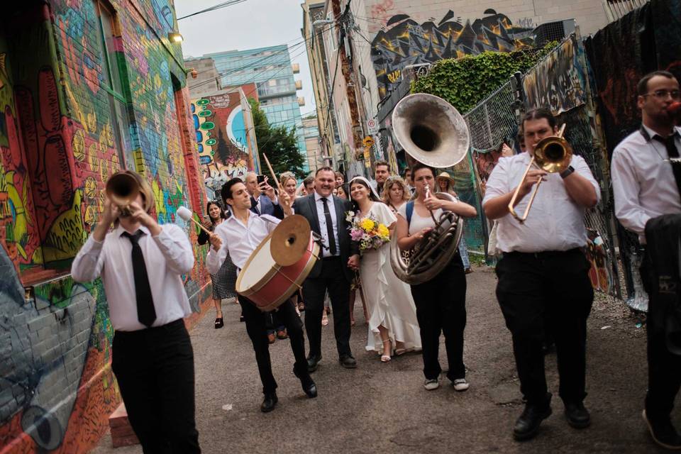 Vibrant outdoor wedding parade