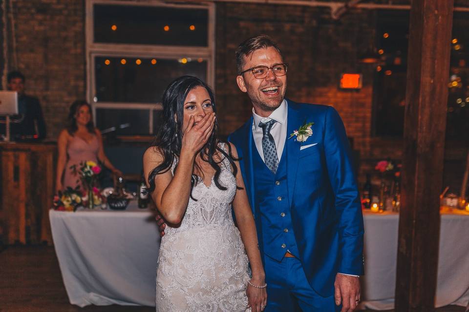 Surprised bride with groom