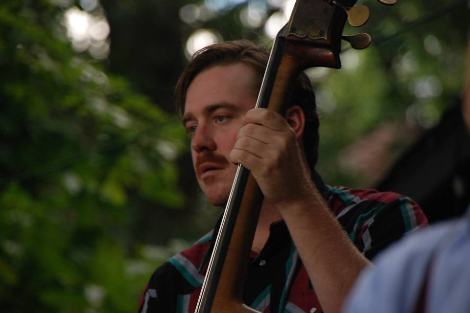 Closeup of bass player
