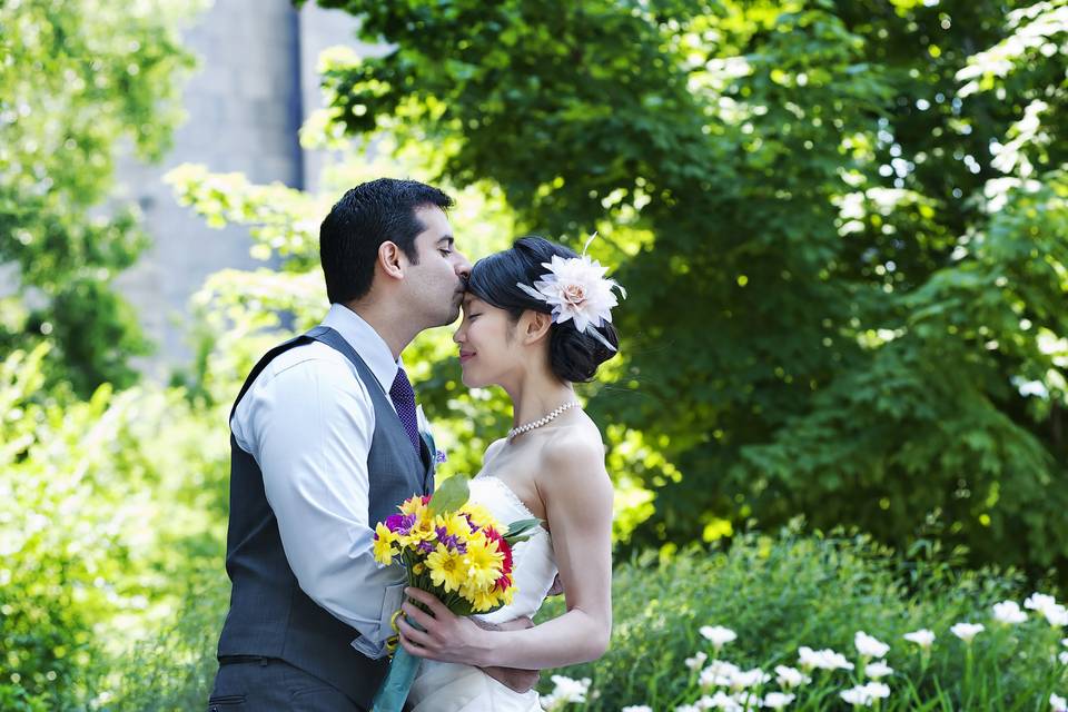 Groom kissing bride